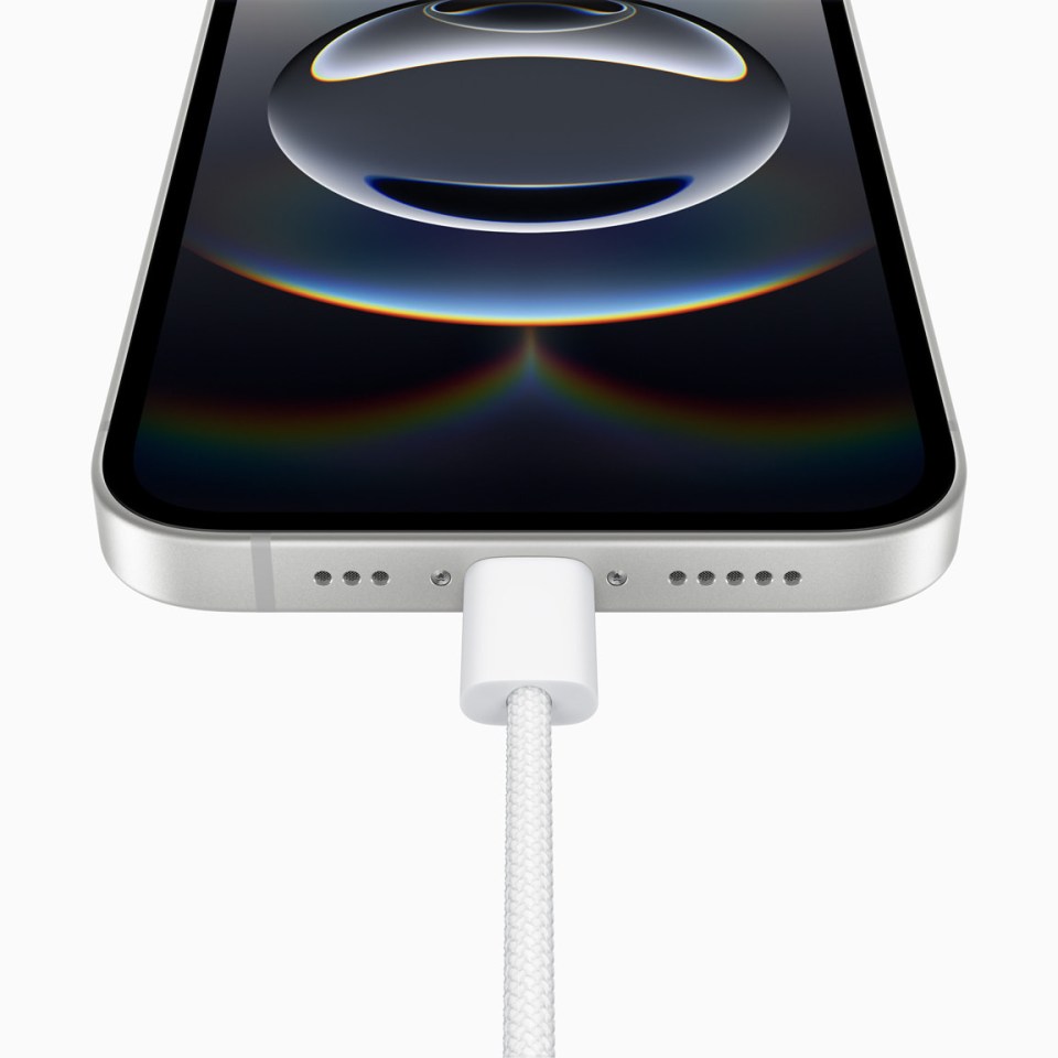 iPhone charging with USB-C cable.