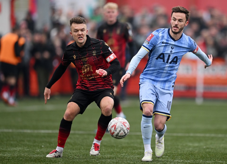 James Maddison of Tottenham Hotspur battling for the ball.