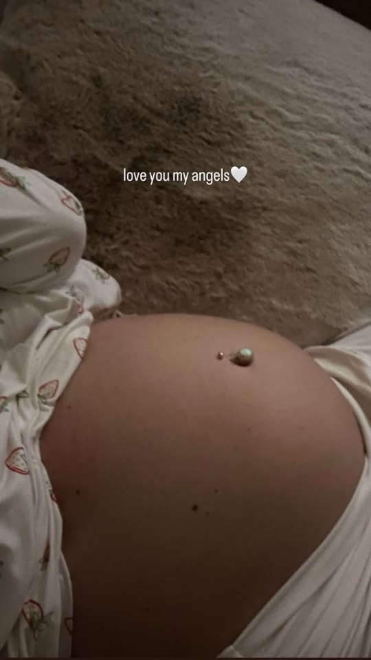 Jesy Nelson's growing baby bump.