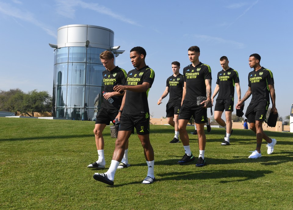 Arsenal players on stationary bikes during training.