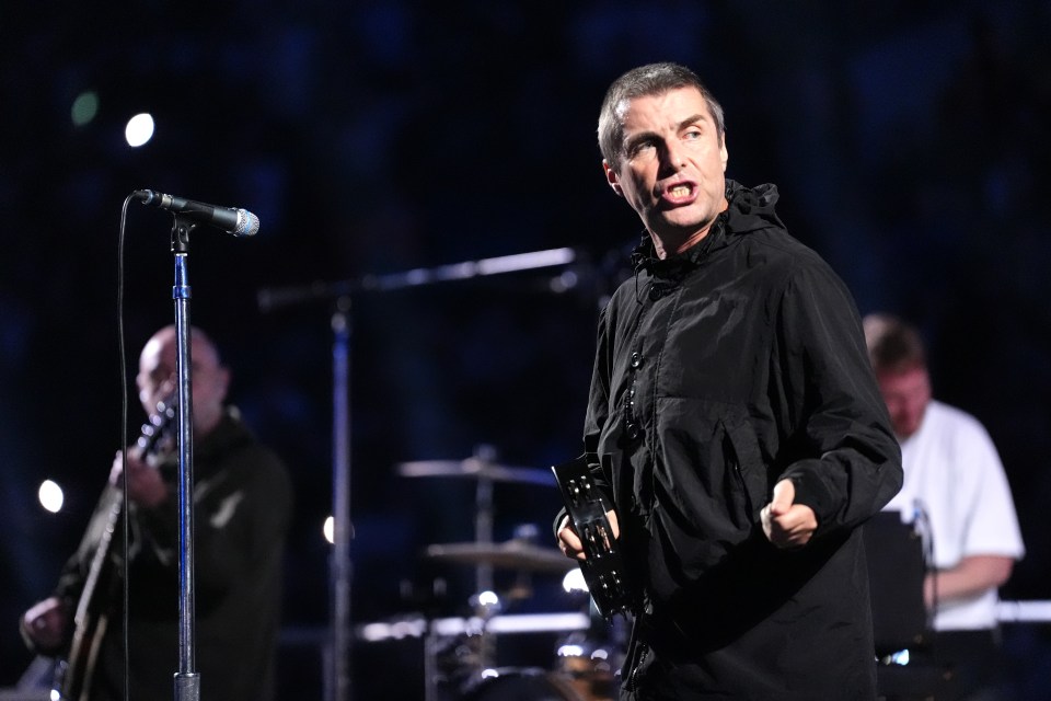 Liam Gallagher of Oasis performing at Wembley Stadium.