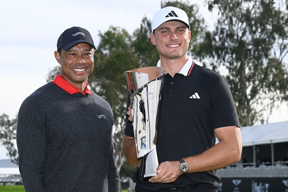 Ludvig Aberg and Tiger Woods with a golf trophy.