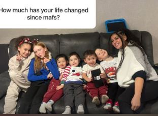 Tasha Jay with children on a couch.