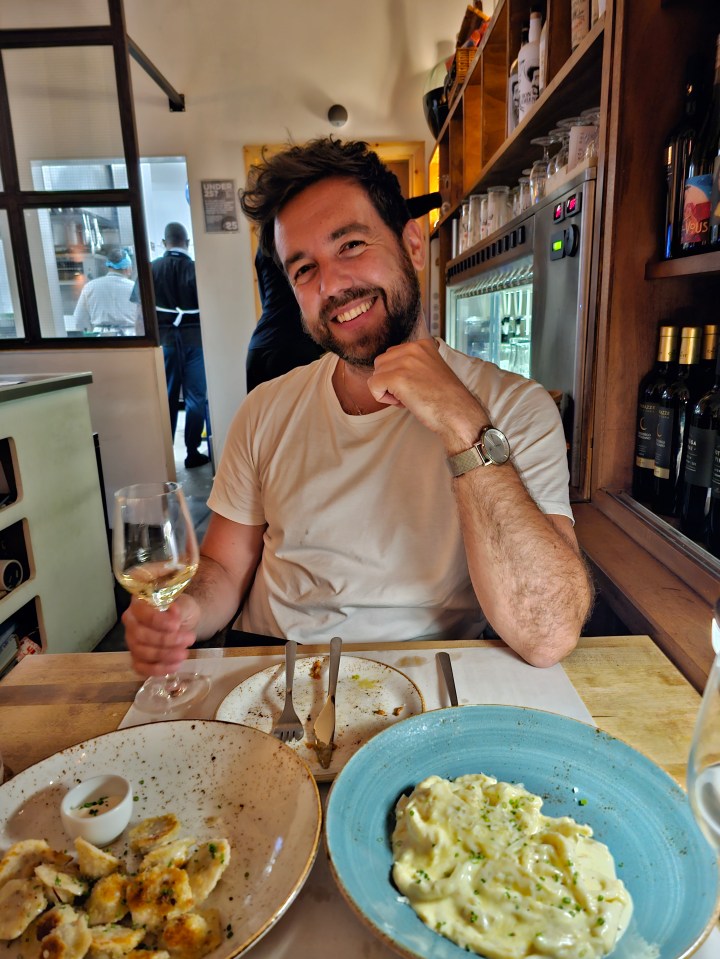 Man enjoying a meal in Manchester.