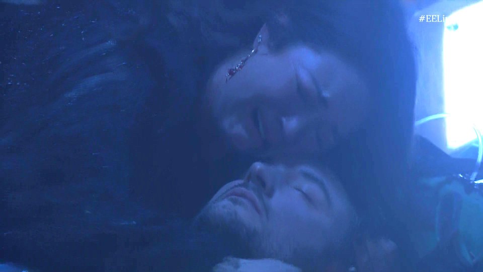 Martin Fowler lying down next to a woman.