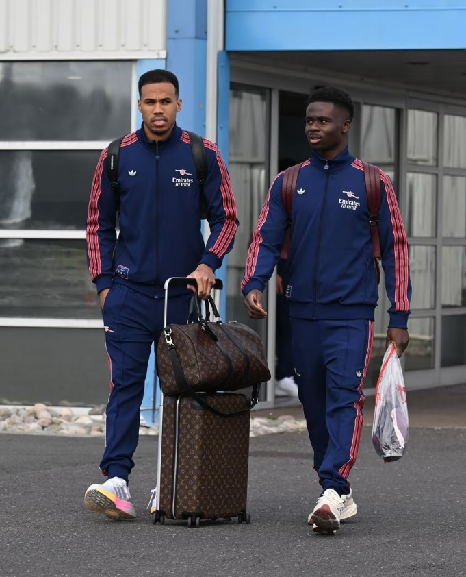 Arsenal players departing for a training camp.