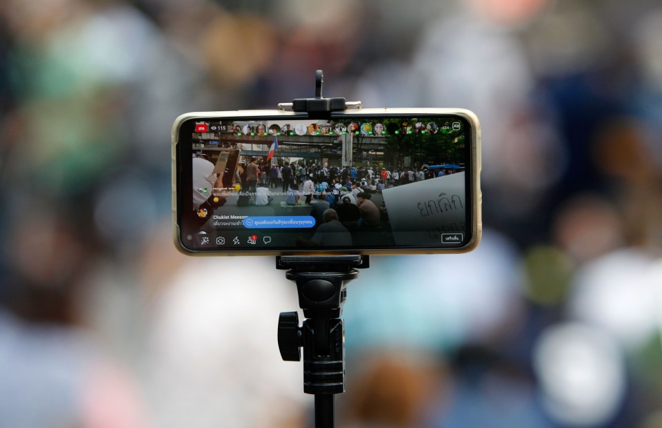 Phone livestreaming a pro-democracy protest.