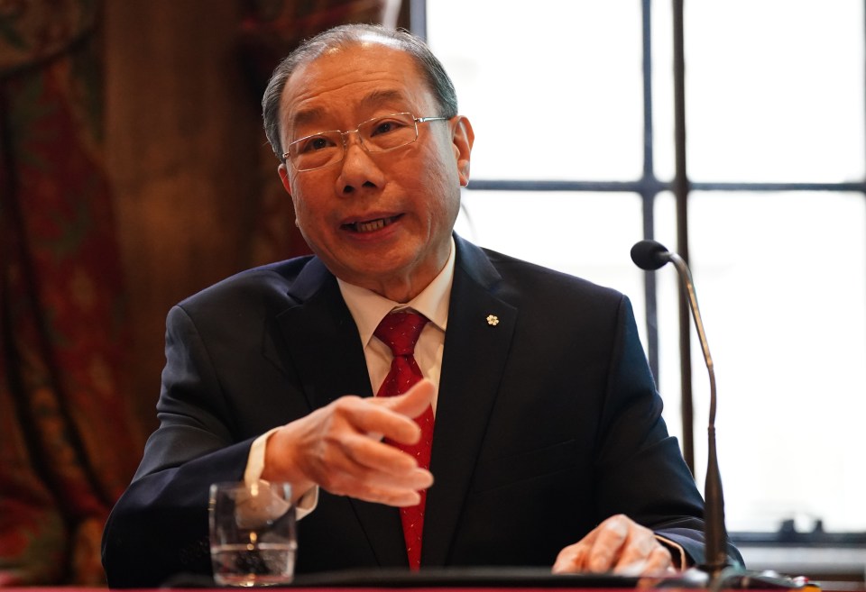 Dr. Shoo Lee speaking at a press conference.