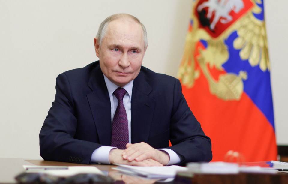 Vladimir Putin at a meeting.