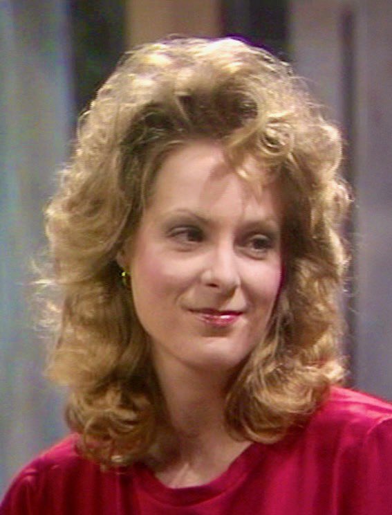 Maya Woolfe as Uli in Auf Wiedersehen, Pet.