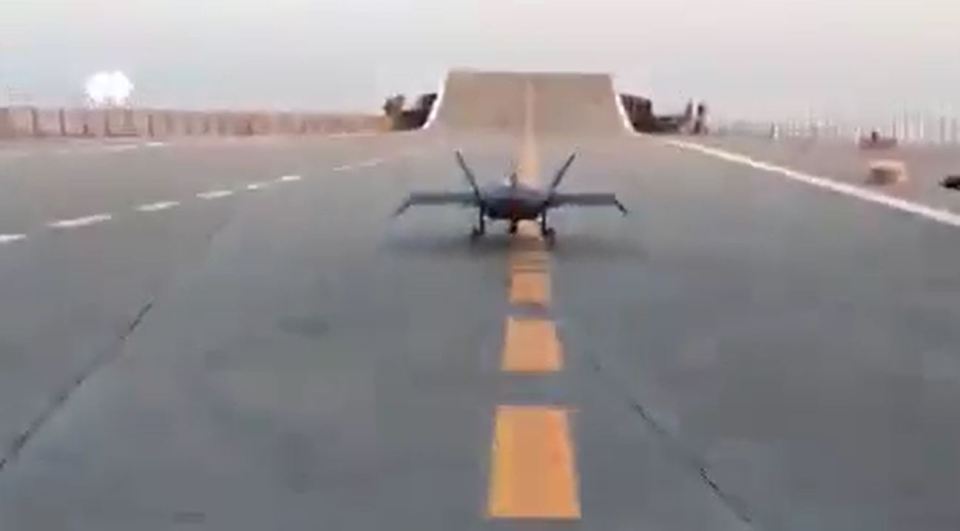 Mini-fighter jet on a runway.