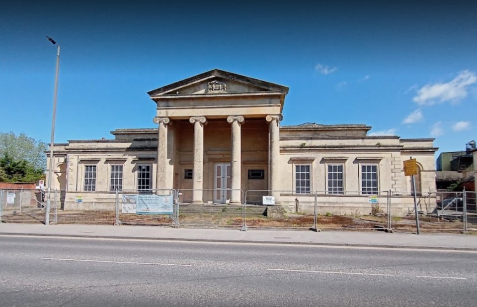 Devizes Assize Court behind a construction fence.