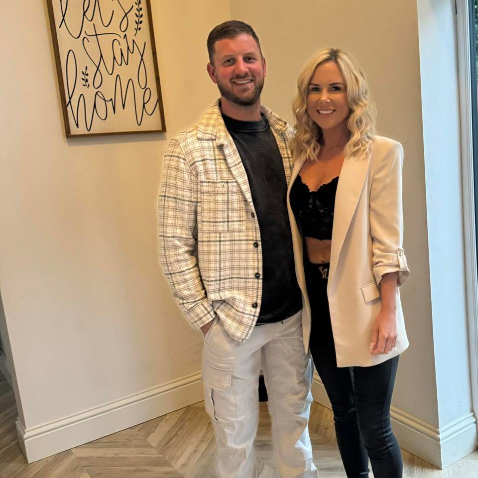 Couple posing for a photo.