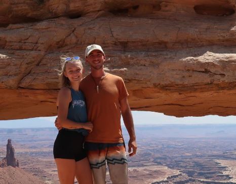 Gabby Petito and Brian Laundrie under a rock formation.