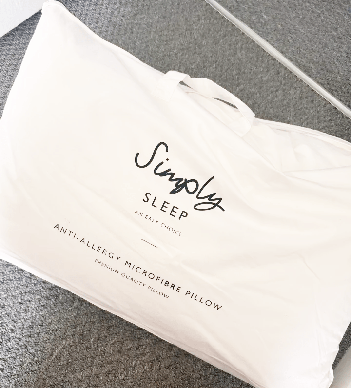 Simply Sleep anti-allergy microfiber pillow in its packaging.