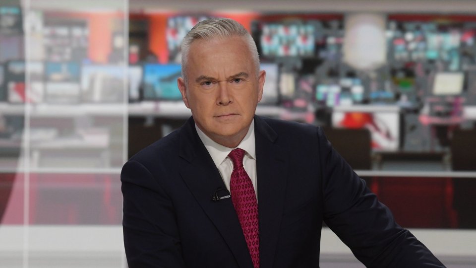 Huw Edwards in a suit.