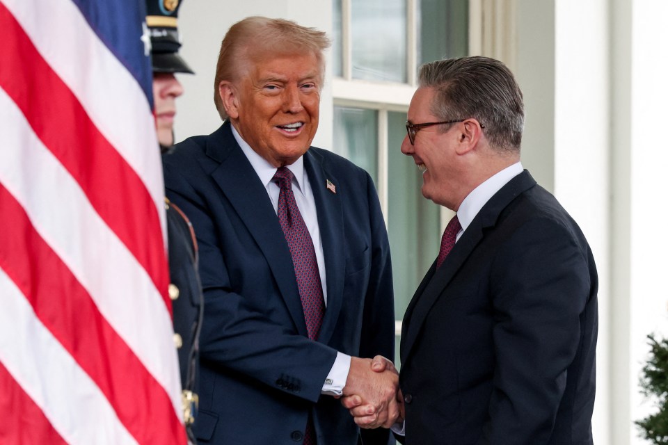 Donald Trump and Keir Starmer shaking hands at the White House.