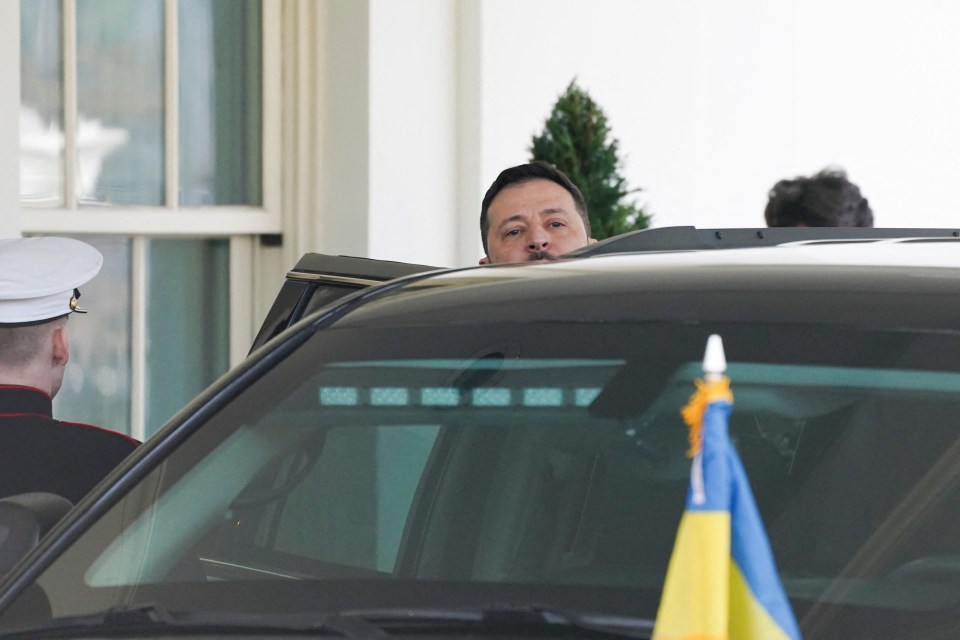 President Zelenskyy departing in a vehicle after a White House meeting.