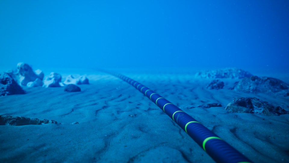 Underwater fiber optic cable on the ocean floor.