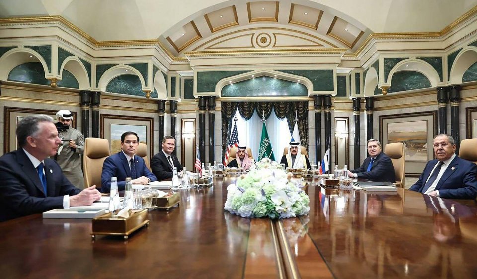 US and Russian officials meeting with Saudi Arabian officials at Diriyah Palace.