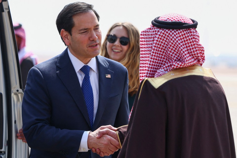 Secretary of State Marco Rubio shaking hands with a Saudi official.