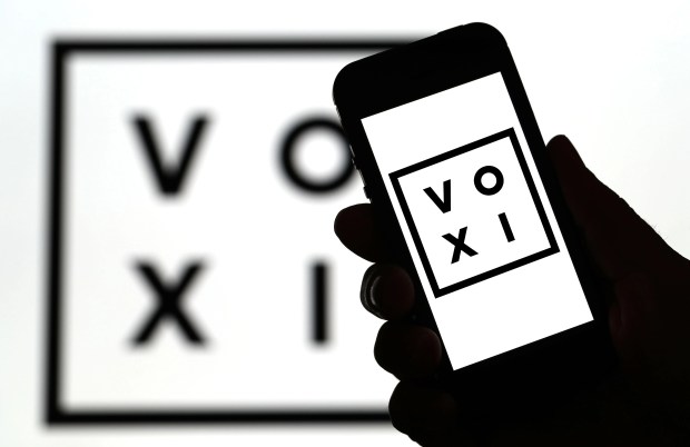 Phone displaying the Voxi logo.