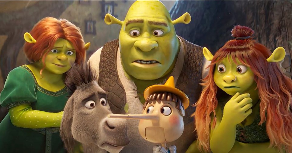 Shrek, Fiona, Donkey, and Shrek's daughters with Pinocchio.