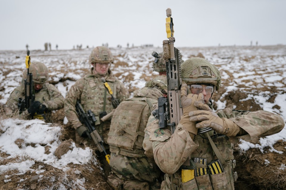 British soldier reloading his gun during NATO Exercise Steadfast Dart in Romania.