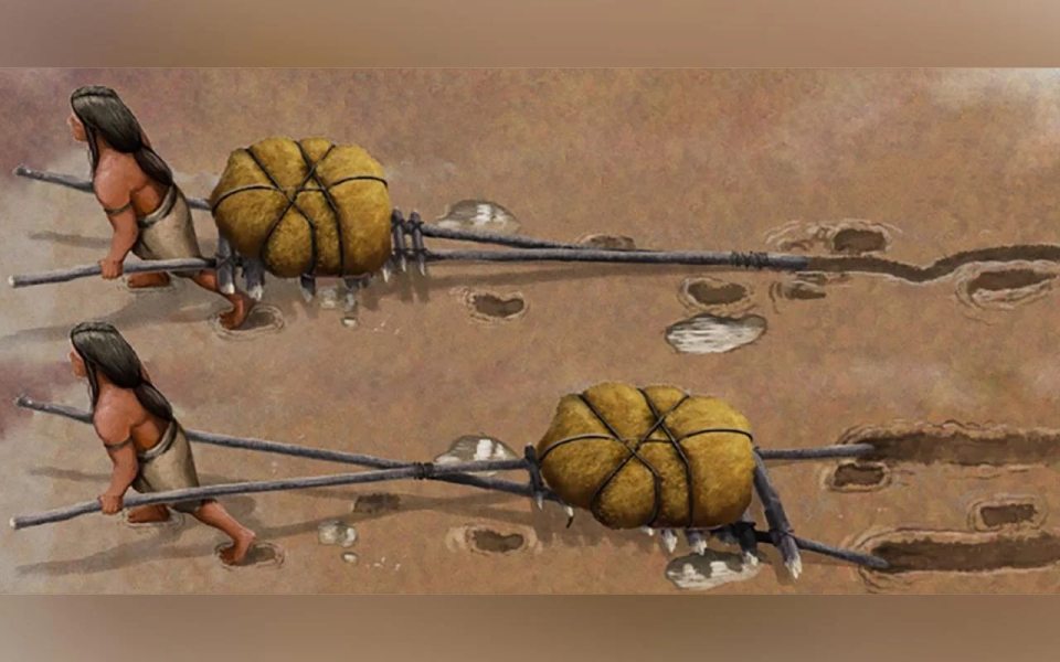 Illustration of prehistoric humans using a travois to transport goods.