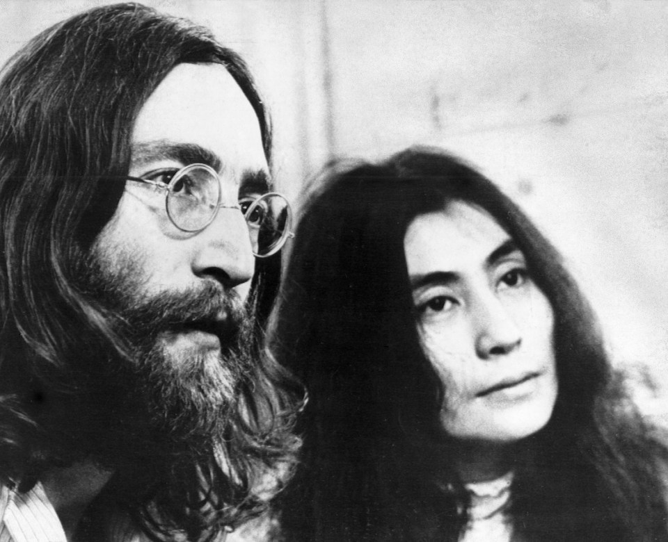 Black and white portrait of John Lennon and Yoko Ono.