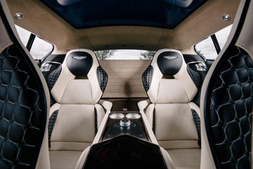 Interior view of an Aston Martin Rapide Jet 2+2's rear seats.