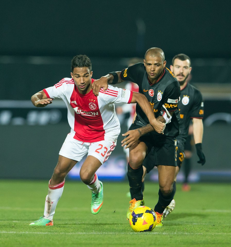 Soccer players vying for the ball.