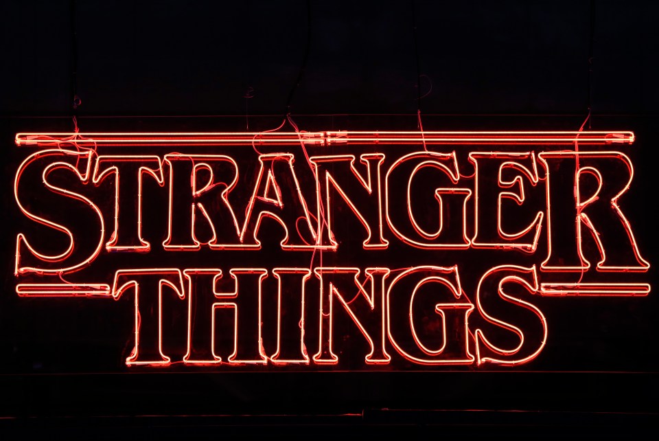 Neon sign reading "Stranger Things".
