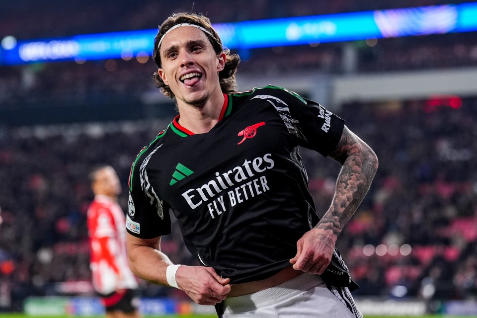 Riccardo Calafiori of Arsenal celebrating a goal.