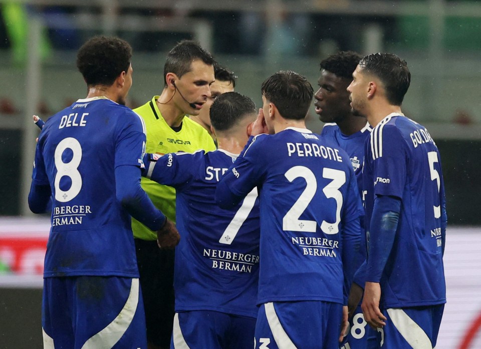 Soccer player Dele Alli receives a red card.