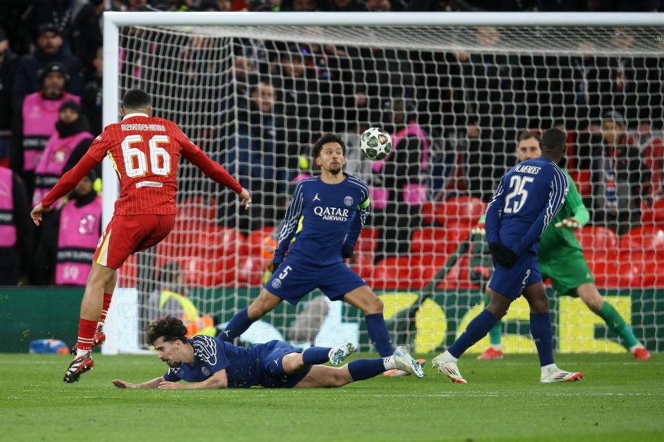Liverpool's Trent Alexander-Arnold shoots, but his attempt is saved during a UEFA Champions League match.