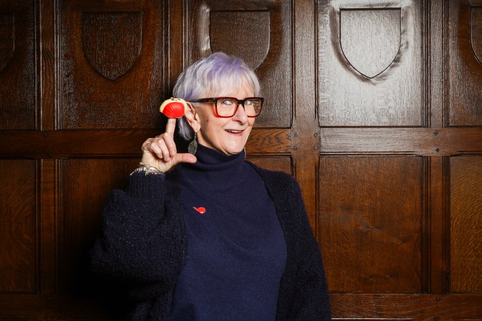 Linda holding a Red Nose Day nose.