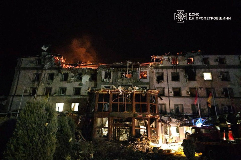 A fire burns in a destroyed building in Kryvyi Rih, Ukraine, following a missile strike.