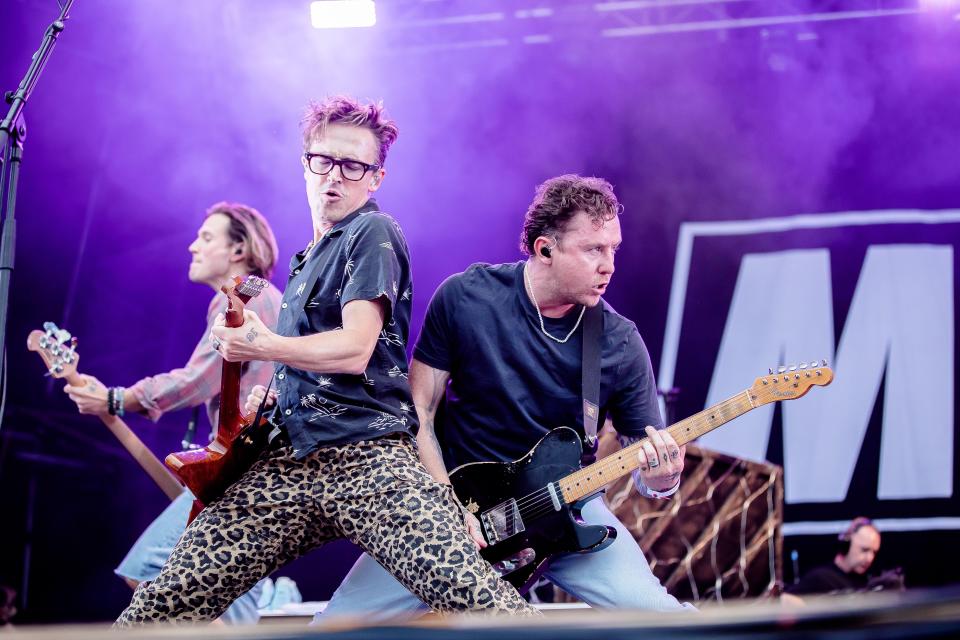 McFly performing on stage.