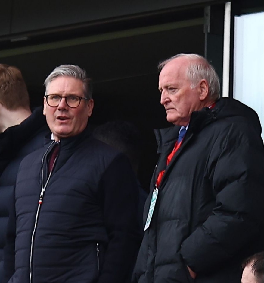 Spectators at an Arsenal soccer match.