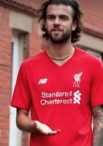Man in Liverpool jersey.