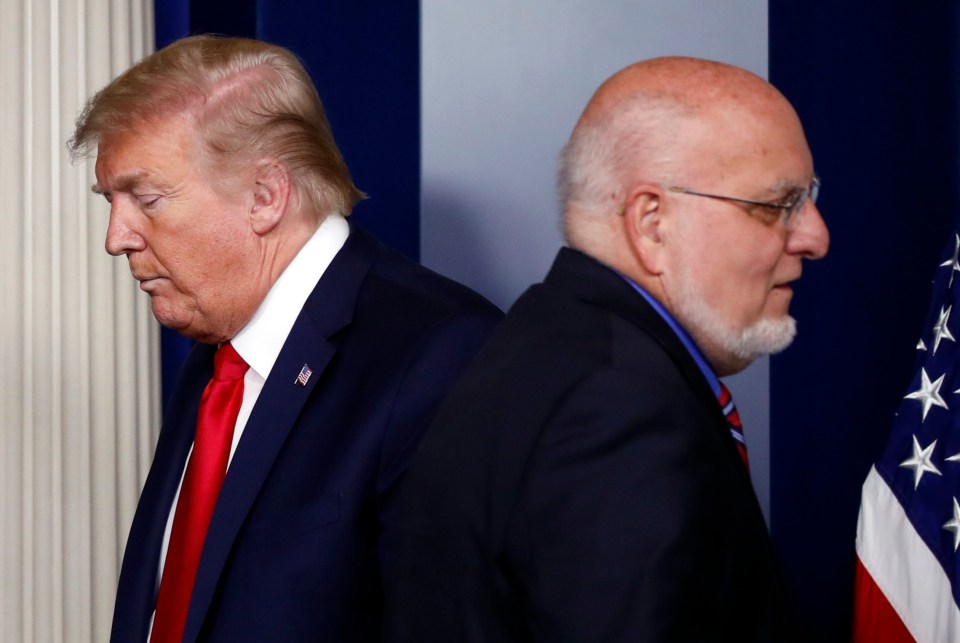 President Donald Trump and Dr. Robert Redfield at a White House briefing.