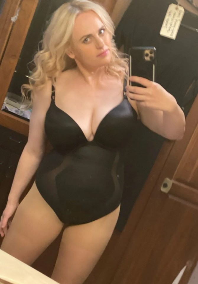 Rebel Wilson in a black bodysuit.