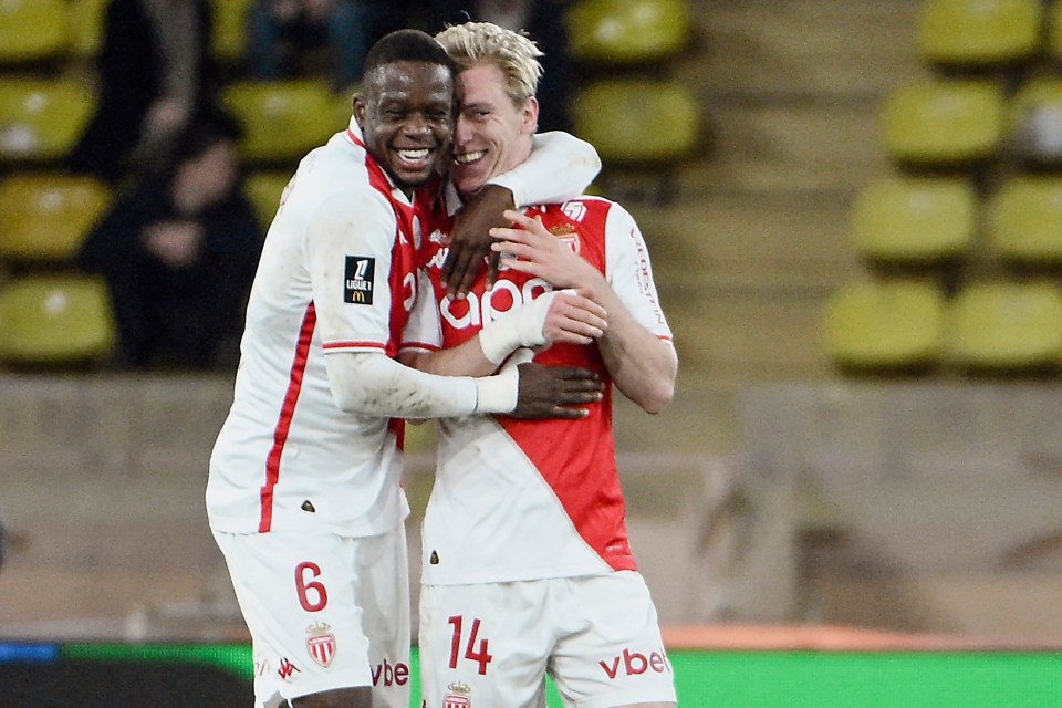 Monaco's Denis Zakaria (#6) and Mika Biereth (#14) celebrating a goal.
