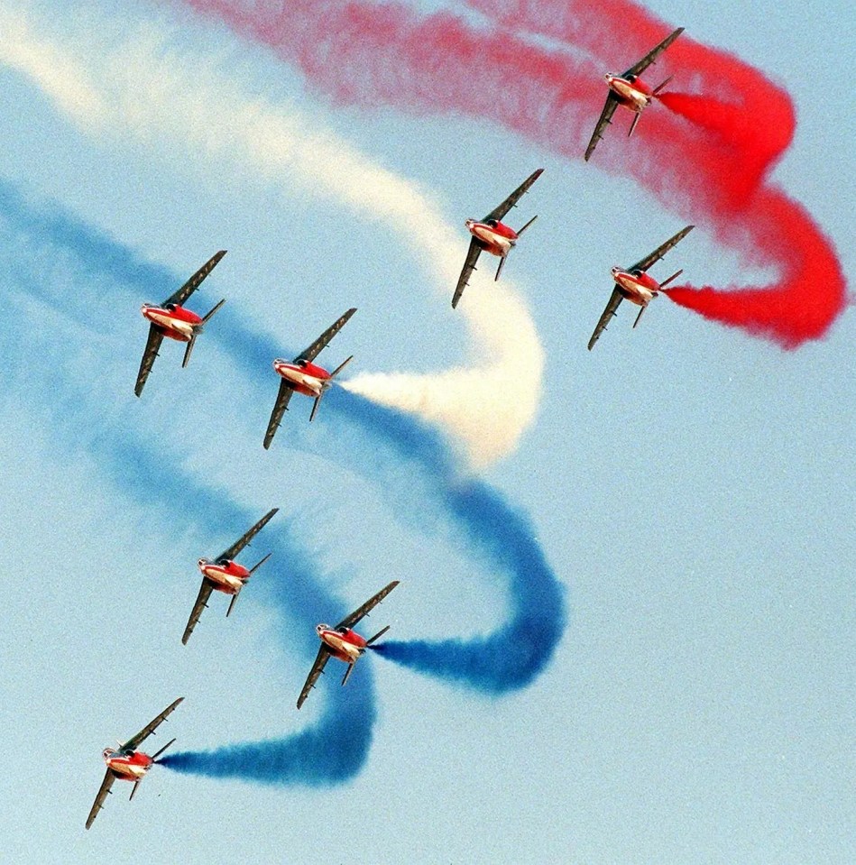Patrouille de France aerobatic team performing.