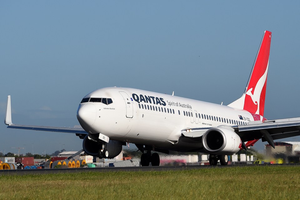 Qantas Boeing 737-800 airplane landing.