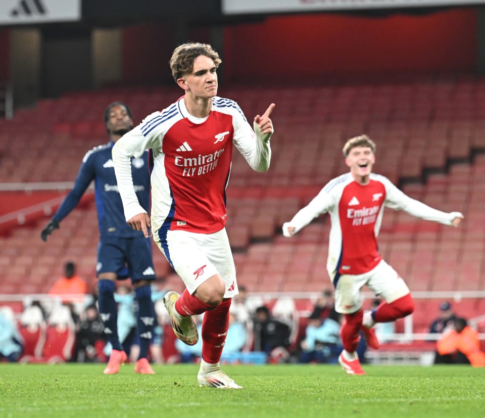 Arsenal player celebrating a goal.