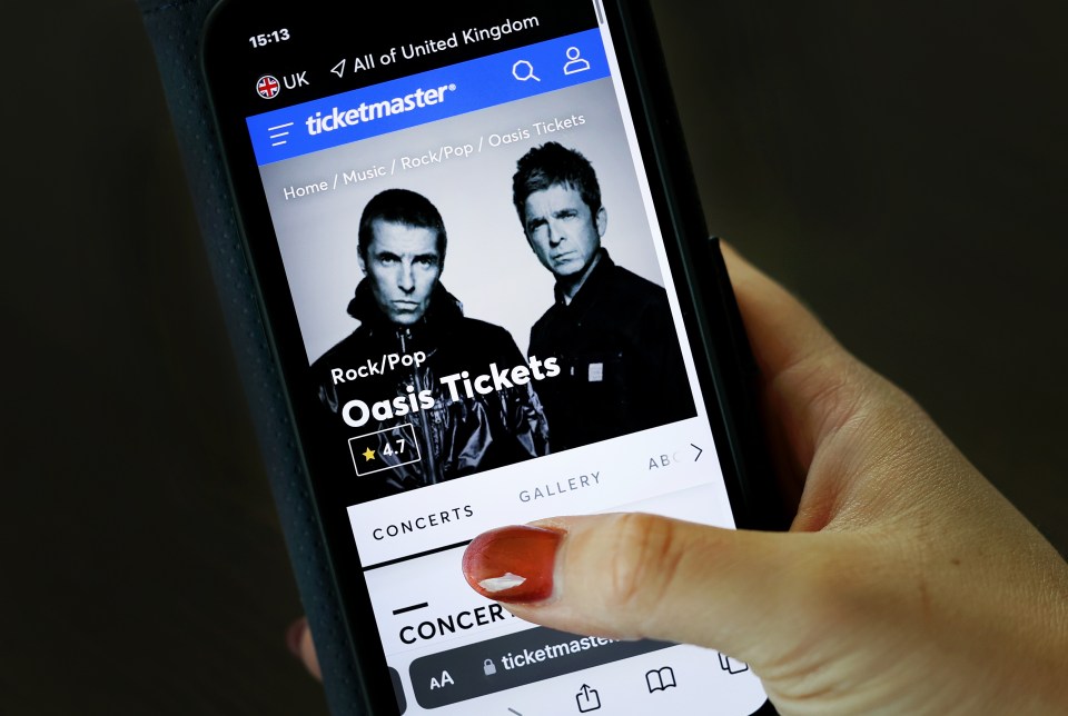 Smartphone displaying Oasis concert tickets on Ticketmaster.