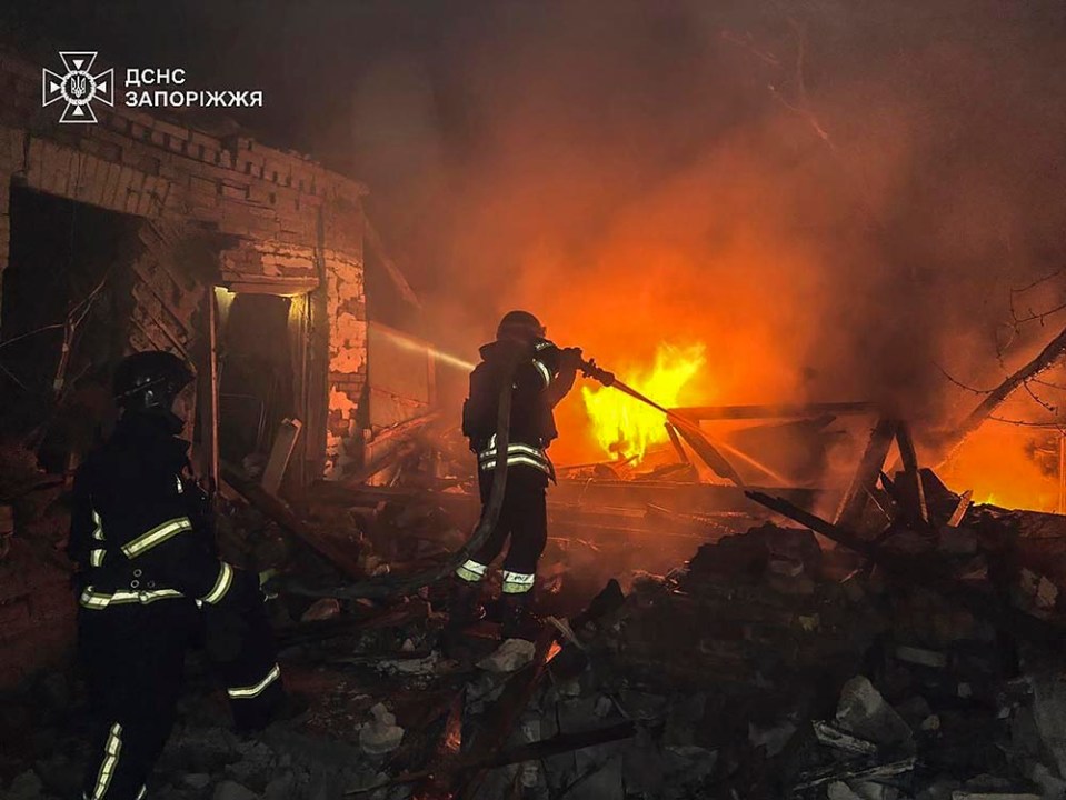 epa11979915 A handout picture made available by the State Emergency Service shows Ukrainian rescuers working at the site of a drone attack in Zaporizhzhia, Ukraine, late 21 March 2025 amid the ongoing Russian invasion. At least two people died and four others were injured according to the State Emergency Service. EPA/STATE EMERGENCY SERVICE HANDOUT HANDOUT EDITORIAL USE ONLY/NO SALES