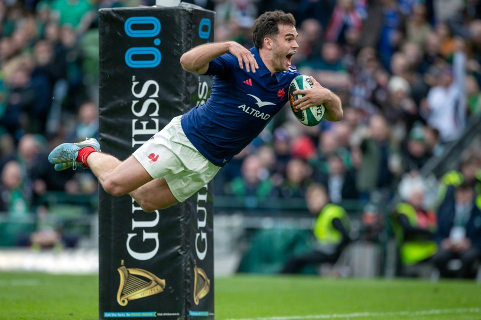 DUBLIN, IRELAND:  MARCH 8:  Damian Penaud #14 of France dives over for a try during the Ireland V France, Six Nations rugby union match at Aviva Stadium on March 8th, 2025, in Dublin, Ireland. (Photo by Tim Clayton/Corbis via Getty Images)